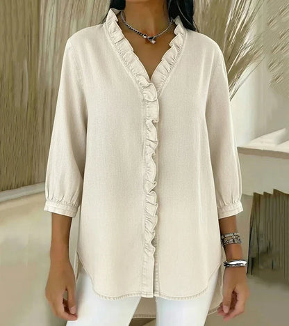 Clemencia — Blusa fluida con escote en V con volantes