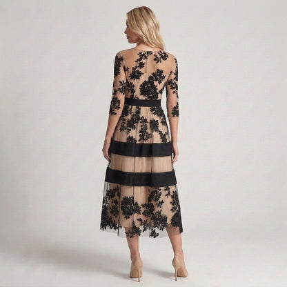 Claudia - Elegante abito in pizzo floreale